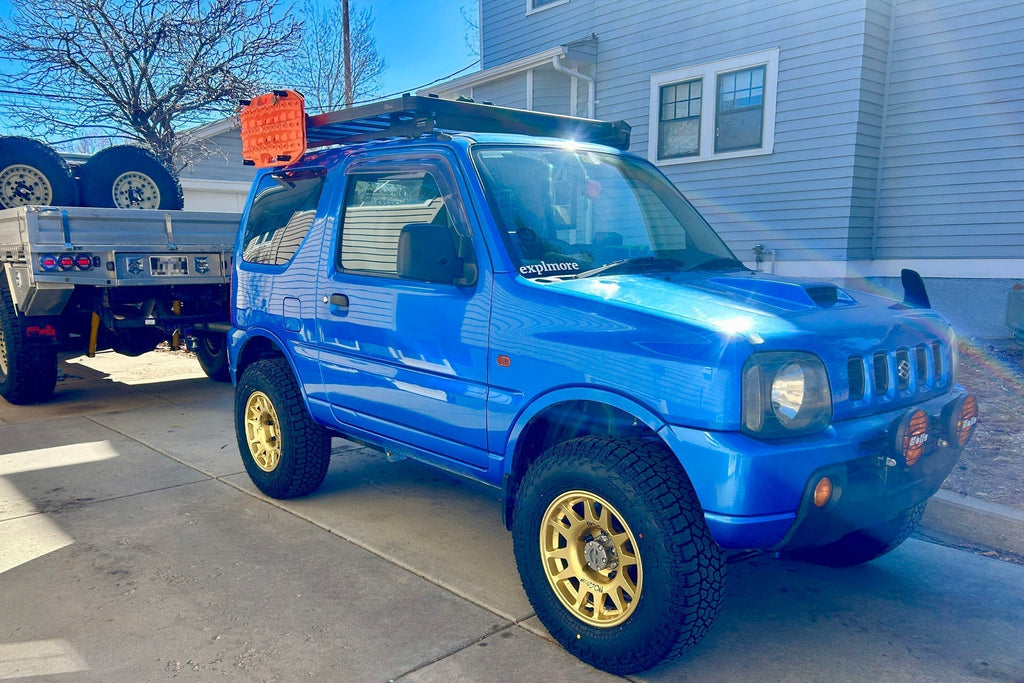 Blue JB43 Suzuki Jimny fitted with Gold EVO Corse DakarZero wheels